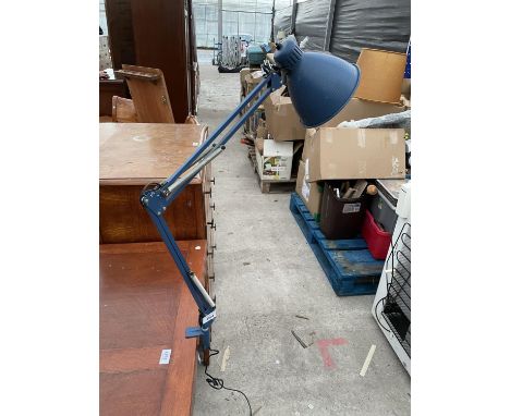 A VINTAGE BENCH MOUNTED ANGLE POISE LAMP 