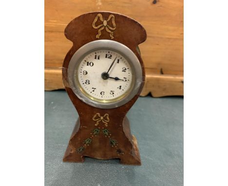 A WOODEN INLAID MANTEL CLOCK 