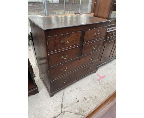 A GEORGE III OAK CHEST OF DRAWERS ON BRACKET FEET, 41" WIDE, THE TOP FOUR DRAWERS CONVERTED TO TWO DOOR CUPBOARD 