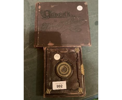 AN OLD BLACK AND WHITE FAMILY ALBUM OF PHOTOGRAPHS TOGETHER WITH AN OGDENS PHOTO ALBUM CONTAINING OLD BLACK AND WHITE PHOTOGR