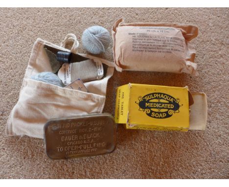 AN ASSORTMENT OF FIRST AID EQUIPMENT TO INCLUDE UNUSED SULPHAQUA SOAP ETC (4) 