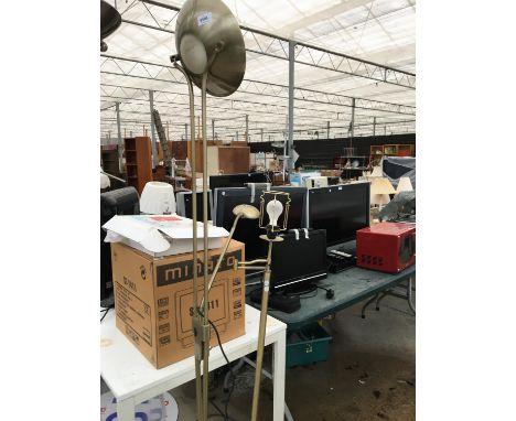 A GOLD UPRIGHT 'MOTHER AND DAUGHTER' FLOOR LAMP BELIEVED IN WORKING ORDER BUT NO WARRANTY 