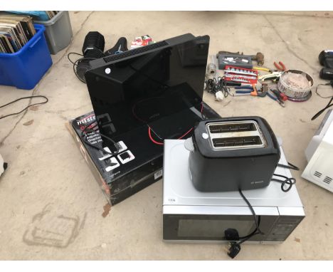 VARIOUS ITEMS TO INCLUDE A TOASTER, MICROWAVE AND A GLASS PANEL HEATER IN WORKING ORDER 
