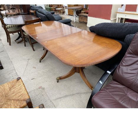 A REGENCY STYLE MAHOGANY TWIN PEDESTAL DINING TABLE, 90x36" FULLY OPEN 