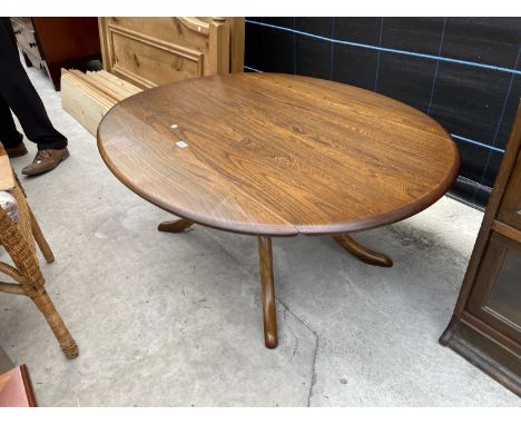 AN ERCOL ELM OVAL DROP LEAF TABLE - 37-5" X 48" 