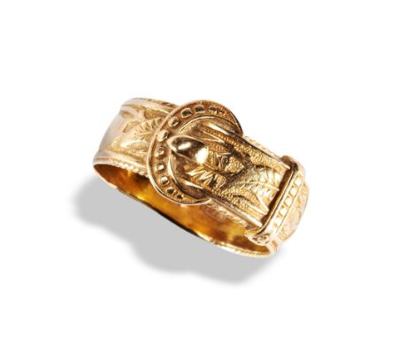 A VICTORIAN 18CT GOLD BUCKLE RING, 1850 the wide band decorated with trailing ivy leaf decoration to a buckle motif. Maker's 