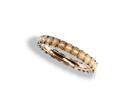 AN EARLY NINETEENTH CENTURY HALF PEARL ETERNITY RING, CIRCA 1830 set throughout with half pearls in a closed back setting.&nb