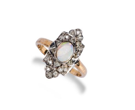 AN OPAL AND DIAMOND ART DECO STYLE RING the central oval opal cabochon collet set over a plaque set with twenty round cut dia