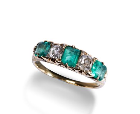 AN EMERALD AND DIAMOND FIVE STONE RING,CIRCA 1890  set with a central emerald cut emerald and two square cut emeralds with tw