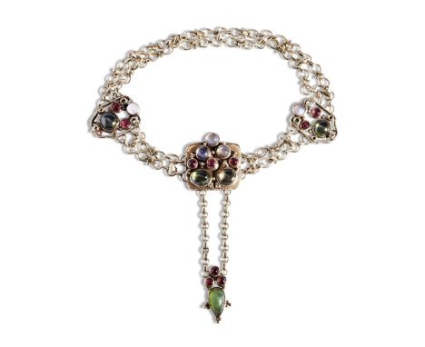 A LATE VICTORIAN RENAISSANCE REVIVAL GOLD, ENAMEL, MOONSTONE, PERIDOT AND GARNET BRACELET CIRCA 1890&nbsp;composed as a doubl