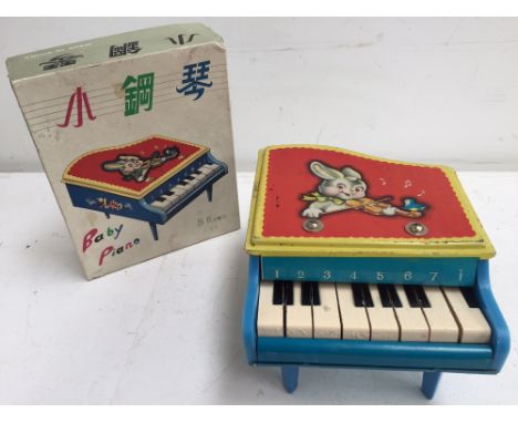 A vintage 8 keys Baby piano UC 538 