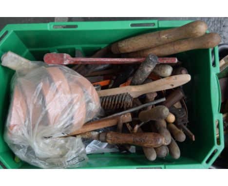 A box of tools including large clipper, spanners, pliers and others