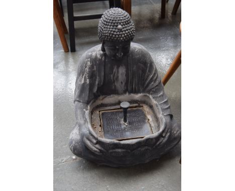 A plastic garden Budda solar lamp/water feature