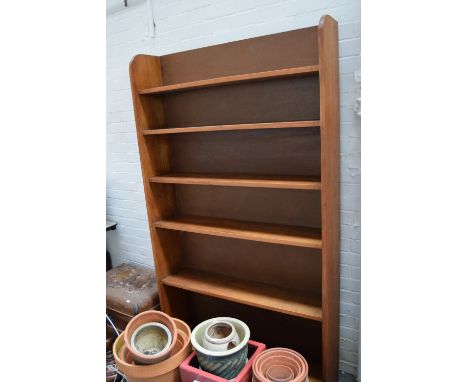 A modern six shelf bookcase 190cm x 107cm