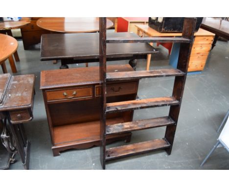 A five shelf wall hanging shelving unit, a side cabinet with two short drawers over adjustable shelf, carved apron and bracke