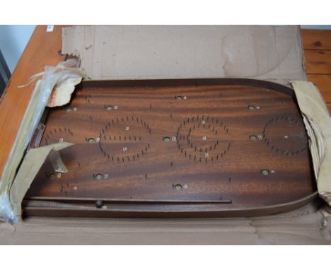A vintage bagatelle board