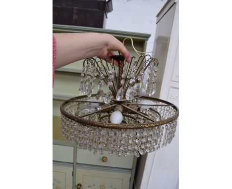A selection of decorative chandelier and shade including a colourful glass lamp shade, a cut glass chandelier in various size
