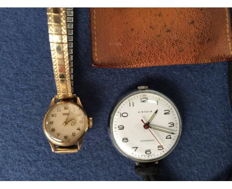 A Tissot gilt metal ladies wristwatch together with a Kienzle pocket watch in a leather case (2)