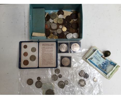 A collection of coins and Bank notes including: Queen Victoria one shilling 1886 F-VF £10, half-crown 1895 F-VF £ 15, a flori