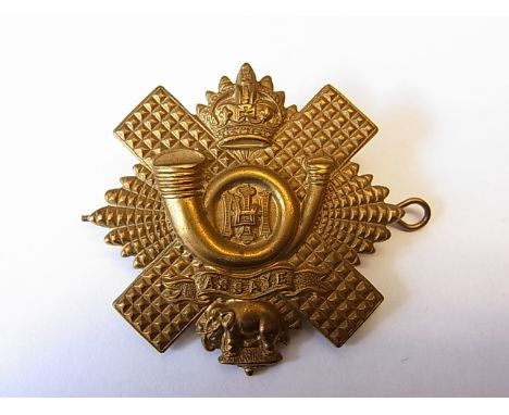 The Highland Light Infantry cap badge, KC (Brass, Lugs) NCO's variant, a scarce cap badge. K&K: 275