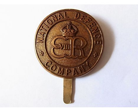 National Defence Company WWII cap badge (Gilding-metal, slider) K&K: 2161