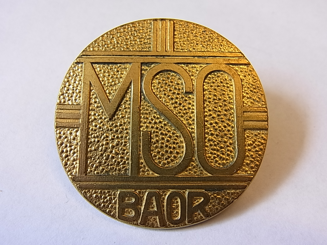 Mixed Service Organisation (MSO) Cap badge, a branch of the British