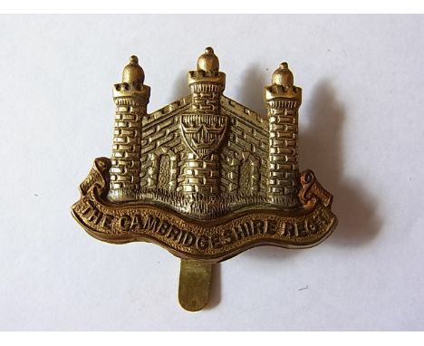 The Cambridgeshire Regiment Officers Territorial Forage Cap Badge: 1908 (Bi-metal, slider) Maker J.R. Gaunt, K&K: 1817