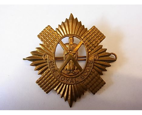 The Royal Scots (Lothian Regiment) WWI economy all brass pattern (Brass, lugs) K&K 589