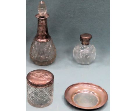 Silver topped pin jar, silver topped scent bottle, silver stemmed decanter, plus silver dish. Various assays, makers and date