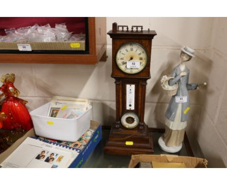 A walnut cased clock and barometer in the form of a miniature long cased clock 