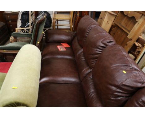 An Italian brown leather three seater sofa 