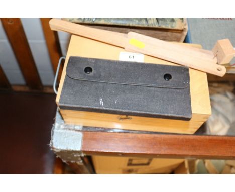 A students boxed microscope  AF; together with a Winsor &amp; Newton drawing instrument set; and a wooden drawing / copying d