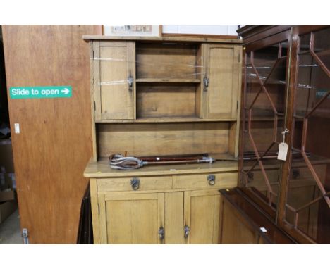 A light oak dresser fitted two drawers 