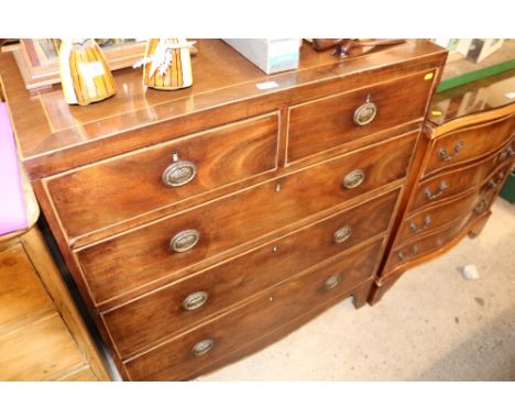 A 19th Century mahogany chest fitted two short over three long drawers raised on bracket feet