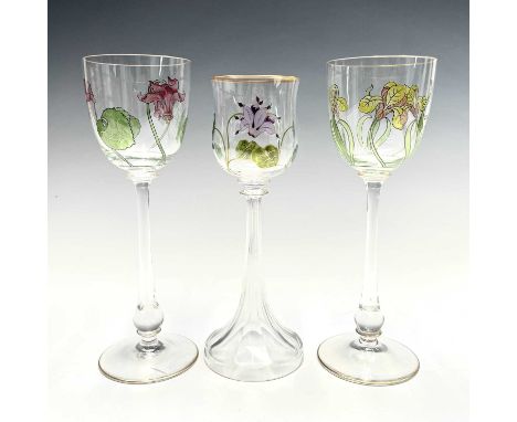 An Austrian hock glass, the bowl painted in the Art Nouveau manner with flowers, height 20cm, together with two similar glass