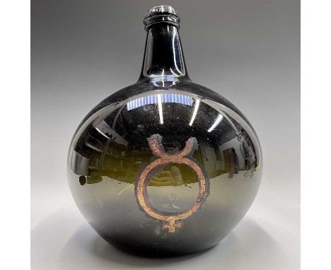 A large green glass apothecary jar, 18th century, of onion form, with gilt symbol for Mercury, height 31cm.Provenance: From t