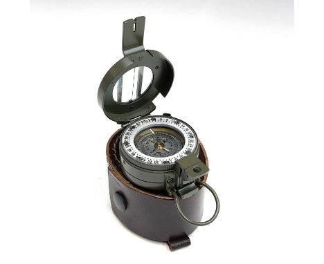 A Francis Barker green M-73 prismatic compass in good condition, with leather case.
