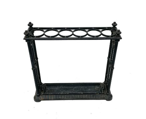 A Victorian Coalbrookdale cast iron stick stand, with six divisions and flowerhead and scroll cast ends, stamped marks and de