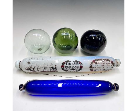 A  Victorian opaque glass rolling pin, transfer printed in black and red with 'The Lass That Loves a Sailor' and a clipper sh