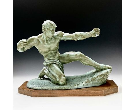 An Art Deco plaster sculpture of a male archer signed Risault on an octagonal wooden base, height 37cm width 53cm depth 20cm.