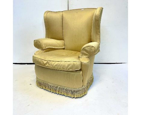 An upholstered armchair, with barrel shaped back, height 101cm.Alan Bennett (1930-2021) was an enormously respected, Cornwall