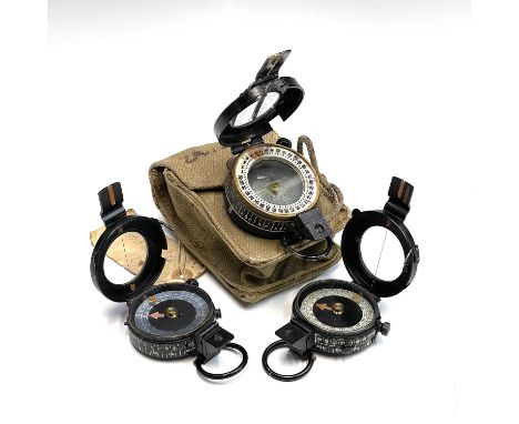 A brass lacquered Candian Kodak Company Military compass marked ckc/C broad arrow 26845c MKIII with canvas case, together wit