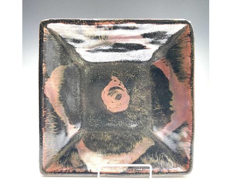 Attributed to Ray Finch, A Winchcombe pottery square dish, with black and rust wax resist decoration, impressed mark, 30cm sq