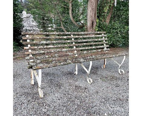 A wrought iron and slatted bench originally from Lord's cricket ground, length 182.5cm.