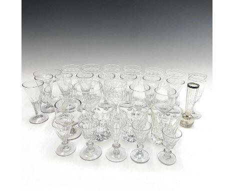 A set of Seven Edwardian cut glass wines, with oval cut panels, together with other Victorian and later glasses (2 boxes).Pro