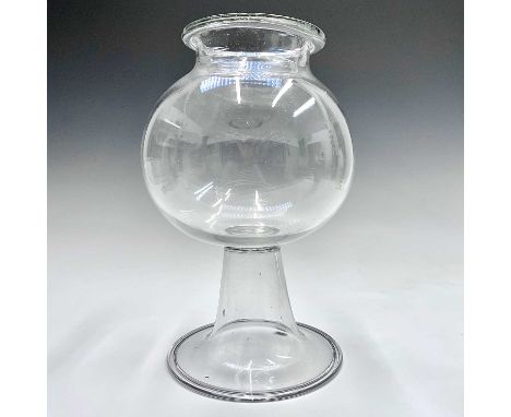 A Georgian blown glass leech jar, of globular form, on a reverse tapered stem with circular folded foot, height 30cm.Provenan