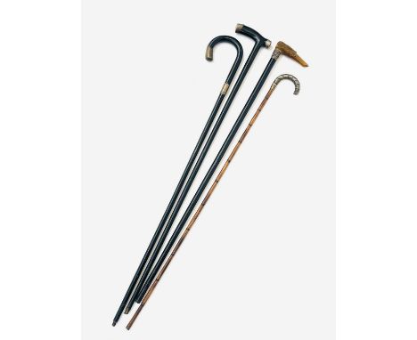 A Victorian ebonised walking stick, with carved horn greyhound head handle, length 87.5cm, together with silver mounted cane 