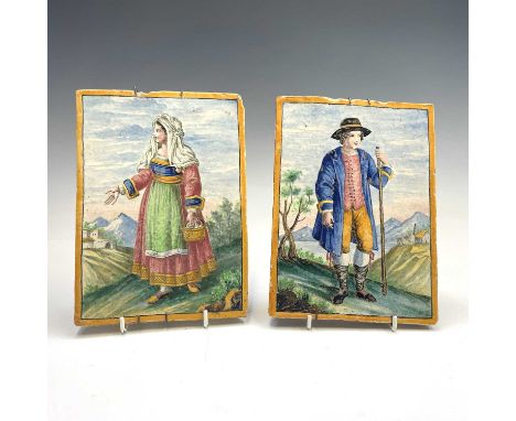 A pair of Italian Maiolica rectangular plaques or tiles, probably 19th century, painted with a portrait of a man and a woman 