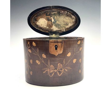 A George III mahogany oval tea caddy, with floral inlaid ribbon tied decoration, width 14.5cm.Provenance:Alan Bennett (1930-2