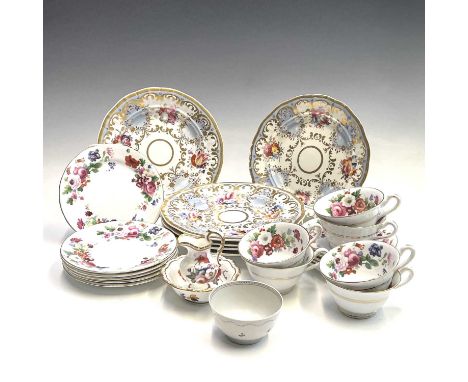 A Floral decorated tea set, circa 1920, retailed by St. Patricks, Broadway, Worcestershire, comprising six cups and side plat